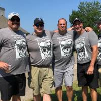5 men in grey ts